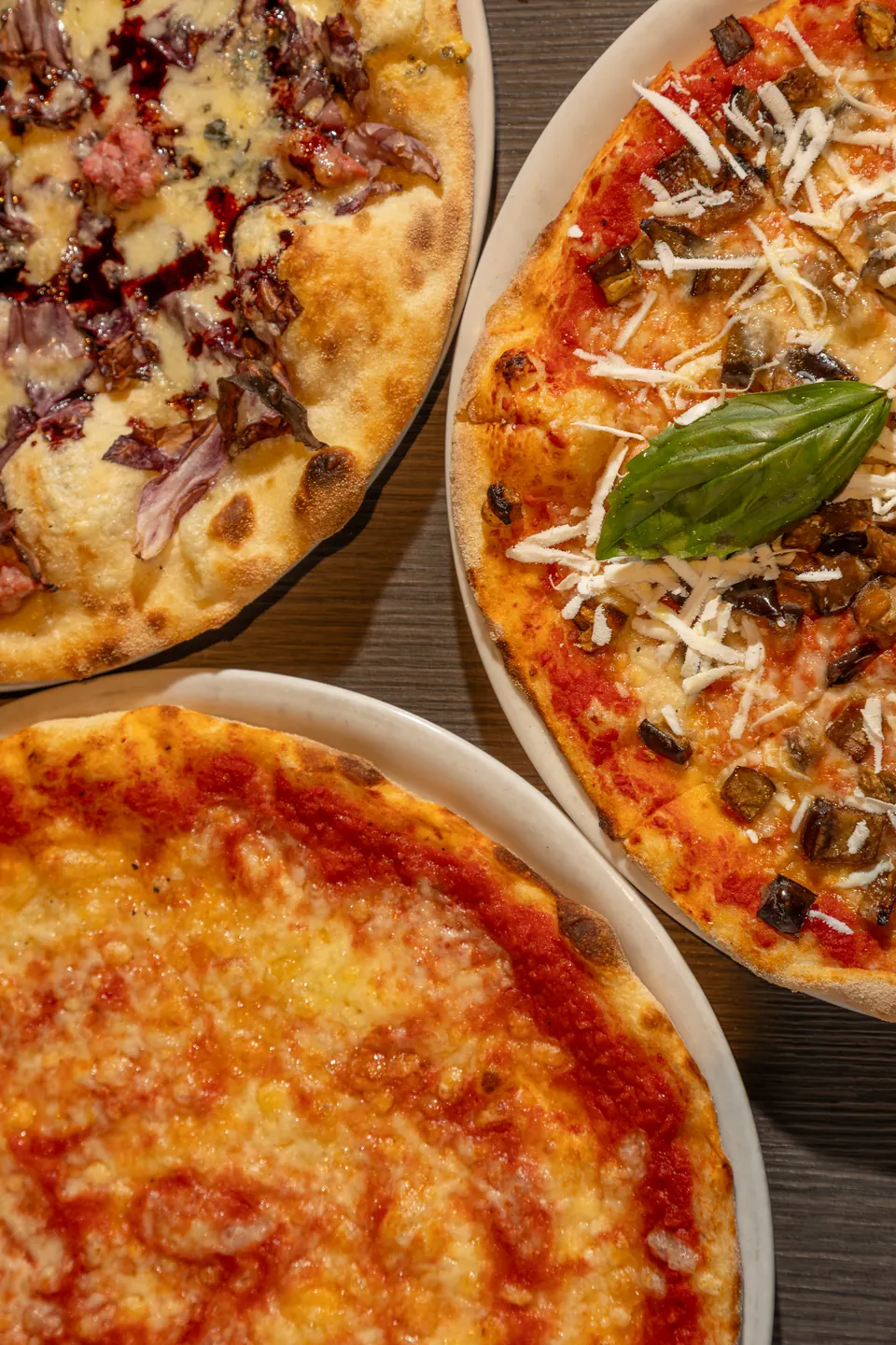 Tre pizze viste dall’alto